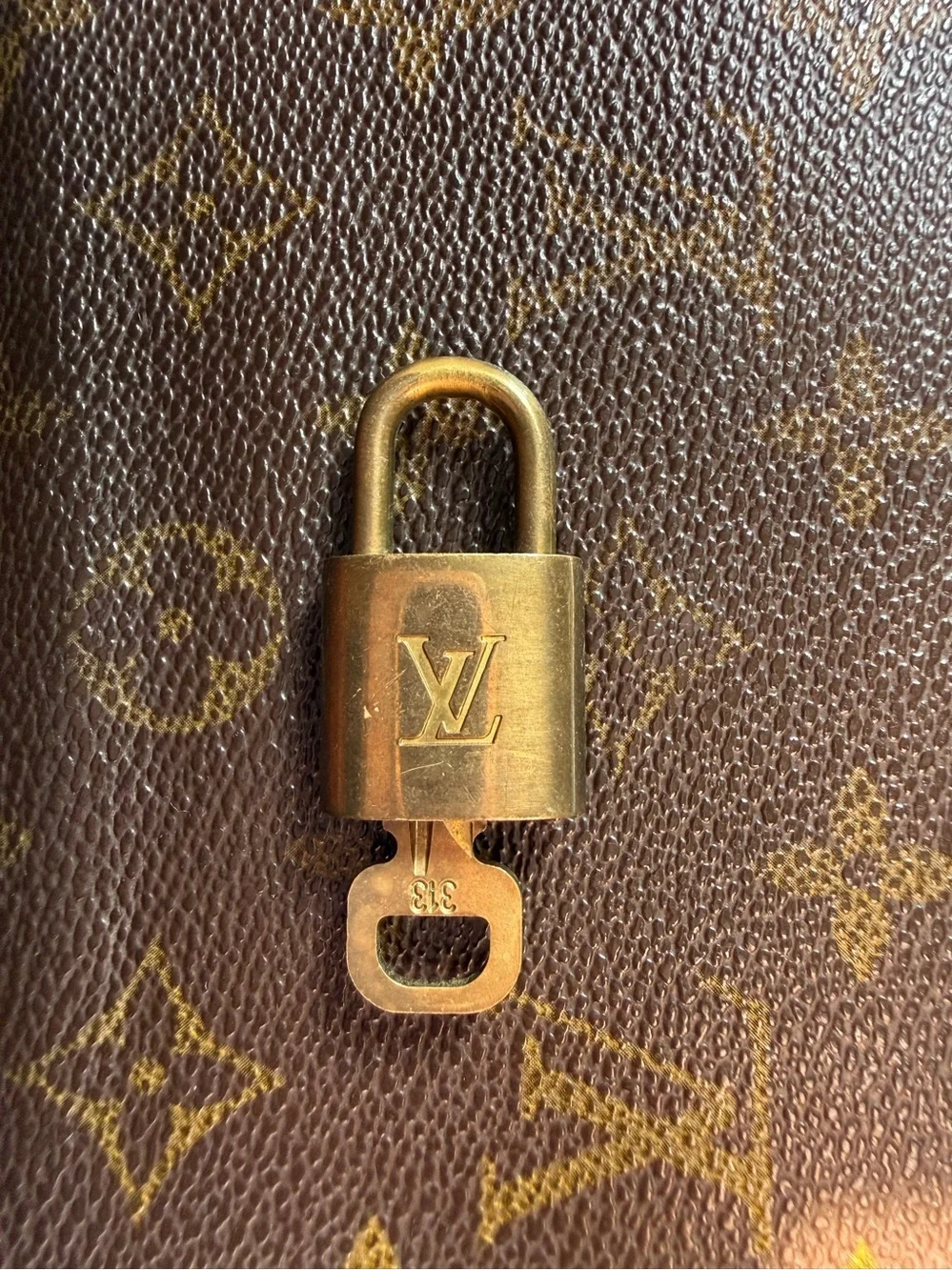 #313 Louis Vuitton Gold Padlock and Key